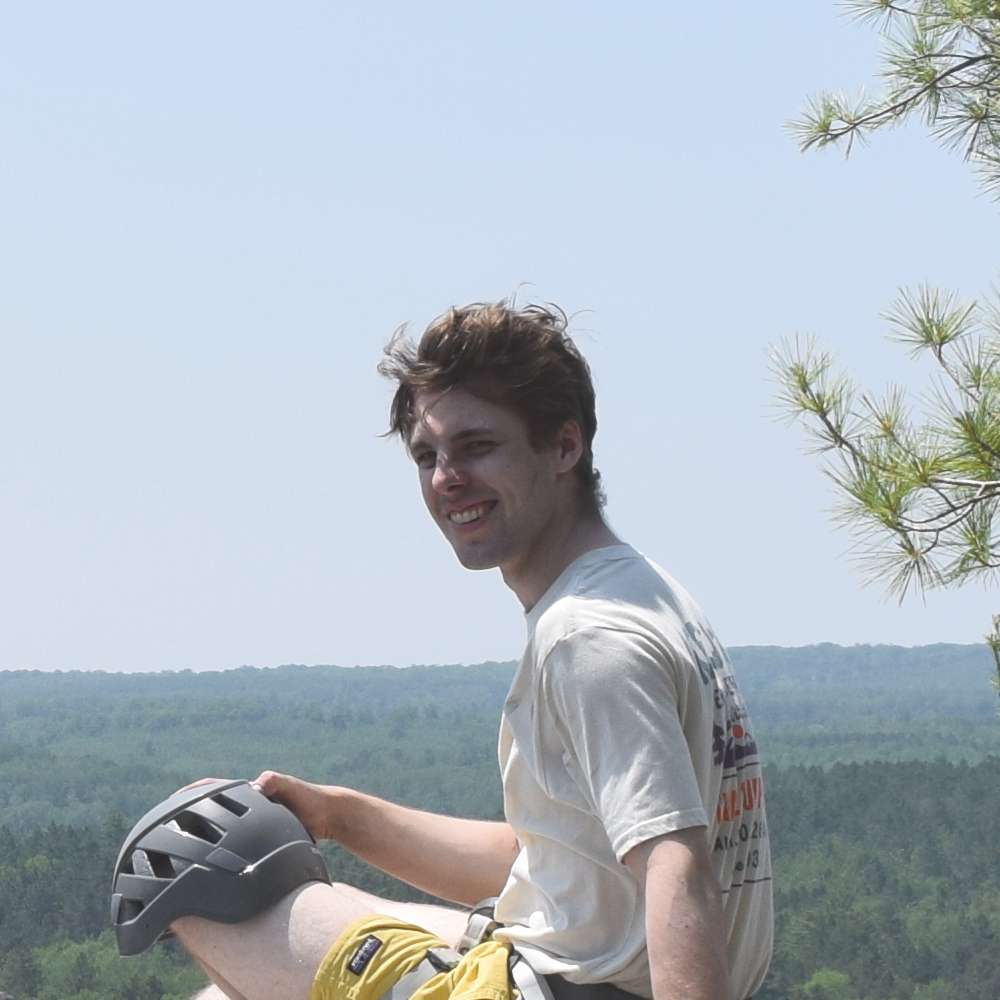 A photo of me overlooking Carney Crag, MI after an arduous climb!